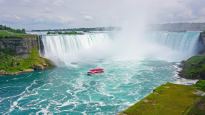 the maid of the mist at the feet of niagara falls